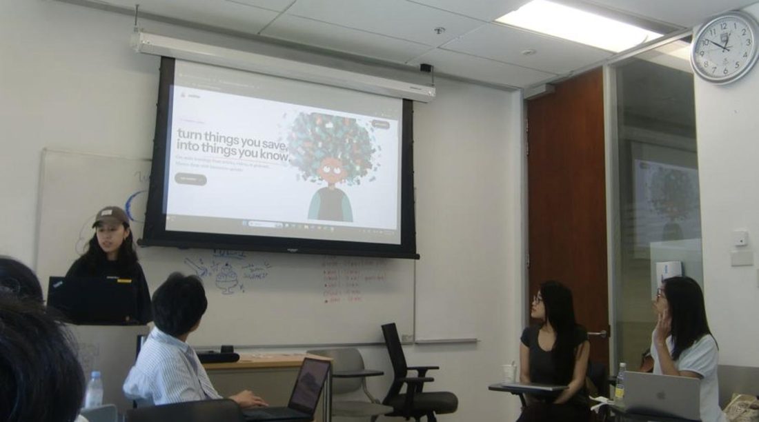 An attendee demoing a project on the projector.